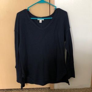 Navy blue long sleeve shirt.